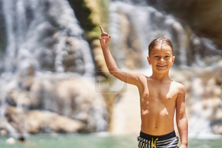 Photo of a boy in Gozalandia Waterfalls. High quality photo