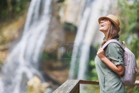 Photo of woman tourist in Gozalandia Waterfalls. High quality photo