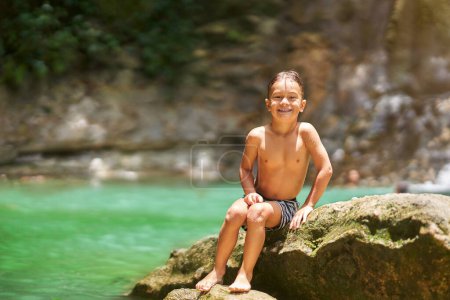 Photo of a boy in Gozalandia Waterfalls. High quality photo