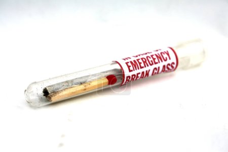Photo for Marijuana. Cannabis. Medical Marijuana. Marijuana Joint in a Test Tube with a match. In Case of Emergency, Break Glass. Isolated on white. - Royalty Free Image