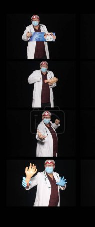 Foto de Médico. Un médico amable y amable sonríe mientras está de pie con un cartel con su retrato en él con un fondo negro. Médico masculino caucásico sonriente con uniforme médico blanco y estetoscopio - Imagen libre de derechos