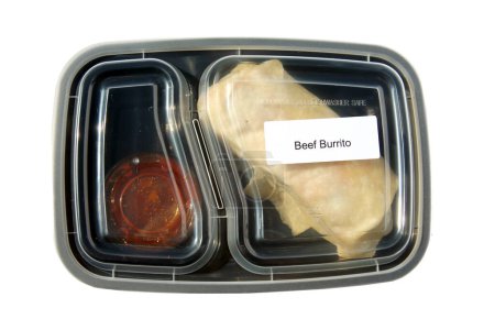 Foto de Beef Burrito. Mexican Beef Burrito. Restaurant Food to Go. Food Delivery. Lunch. Dinner. Packaged Food to go. Isolated on white. Room for text. Lunch Time. - Imagen libre de derechos