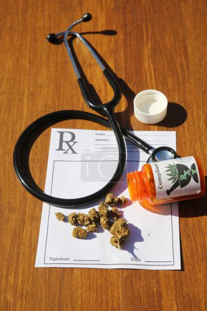 Photo for Medical Marijuana. Close Up Cannabis. Doctors Prescription For Weed. Medicinal Pot With Stethoscope. A prescription for medical marijuana. Medical cannabis on table close up. - Royalty Free Image