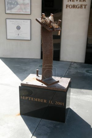 Photo for Huntington Beach, California - USA - April 23, 2023: 911 Sculpture remembering the tragic day America was viscously Attacked by Terrorist. - Royalty Free Image