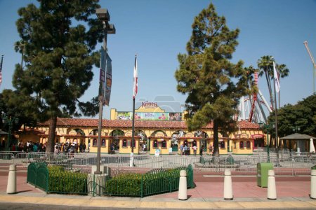 Photo for Buena Park, California - USA - April - 27-2023: Knott's Berry Farm. Knotts Berry Farm entrance and ticket booths. Entrance Gates with Roller Coaster Rides in the background. A Fun Time had for all. - Royalty Free Image