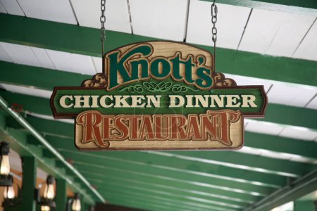 Photo for Buena Park, California - USA - April - 27-2023: Knott's Berry Farm. Knotts Berry Farm entrance and ticket booths. Knott's Chicken Dinner Restaurant entrance and Sign. People world wide love Knott's. - Royalty Free Image