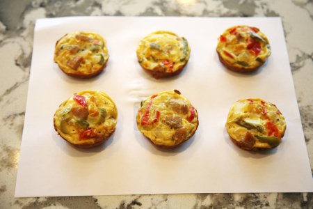 Photo for Breakfast egg muffins. Egg Cups. Part of a low carb or Keto diet. Breakfast Egg Muffins are a delicious healthy food and PERFECT for meals. Protein packed eggs muffins. They are great for Keto diets. - Royalty Free Image