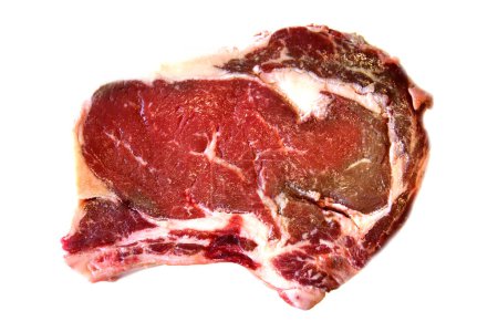 Téléchargez les photos : Steak de côtes de boeuf. USDA Choice Beef Rib Steak Bone In. Viande crue. Isolé sur blanc. De la place pour le texte. Clipping Path. Steak pour le déjeuner ou le dîner. Steak de qualité supérieure. - en image libre de droit