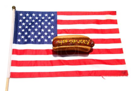 Photo for Hotdog with the text written in Yellow Mustard. Isolated on white. - Royalty Free Image
