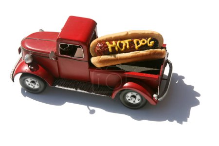 Photo for Hotdog in Yellow Mustard. Hotdogs for Lunch. Hot dog with the text in yellow mustard. Isolated on white. Hotdog in a truck in its bun. - Royalty Free Image