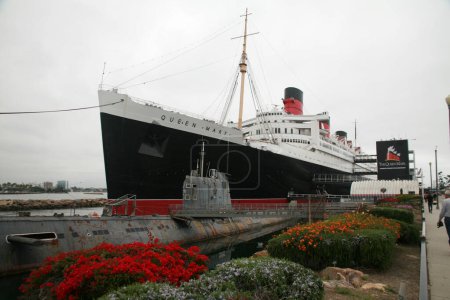 Téléchargez les photos : Long Beach, Californie - États-Unis - 14 juin 2023 : The Queen Mary. Le Queen Mary est un paquebot britannique à la retraite qui a navigué principalement sur l'océan Atlantique Nord de 1936 à 1967. Ocean Liner. - en image libre de droit