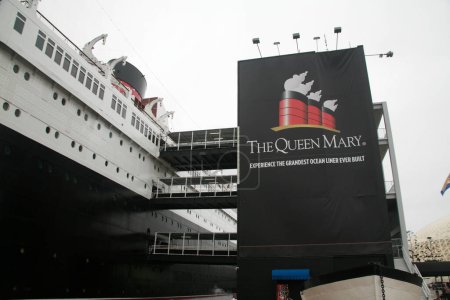 Téléchargez les photos : Long Beach, Californie - États-Unis - 14 juin 2023 : The Queen Mary. Le Queen Mary est un paquebot britannique à la retraite qui a navigué principalement sur l'océan Atlantique Nord de 1936 à 1967. Ocean Liner. - en image libre de droit