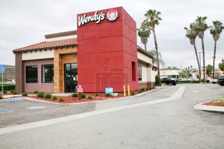 Photo for Irvine, California - USA - June 1, 2023: The Wendy's in Irvine California. Wendy's Company is an American holding company for the major fast food chain Wendy's. Its headquarters are in Dublin, Ohio. - Royalty Free Image