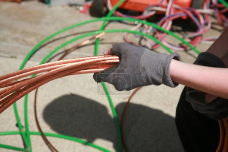 Photo for Lake Forest, California - USA - May 7 2023: Copper wire. Scrap electrical wire for recycling. Old electrical wire. Messy pile of colorful cables network chaos of multicolor wires. Construction waste - Royalty Free Image