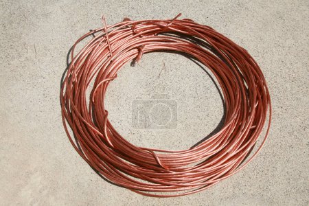 Photo for Copper wire. Scrap old Copper Wire for recycling. Non-ferrous metals. Electrical wiring. Beryllium Copper wire. Bare bright. Bright and Shiny. Electrical Wires. Recycling. Industrial Copper Wire. - Royalty Free Image
