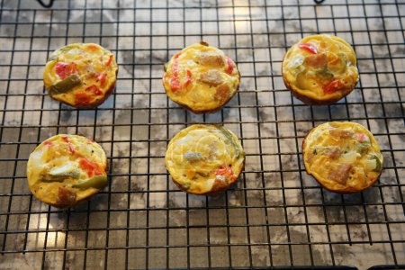 Photo for Breakfast egg muffins. Egg Cups. Part of a low carb or Keto diet. Breakfast Egg Muffins are a delicious healthy food and PERFECT for meals. Protein packed eggs muffins. They are great for Keto diets. - Royalty Free Image