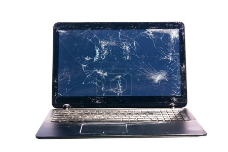Photo for Laptop computer with a broken and cracked screen. Isolated on white. Room for text. Computer Repair. - Royalty Free Image