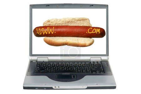 Téléchargez les photos : Ordinateur portable avec un hot dog avec slogan écrit en moutarde jaune "www. .com" - en image libre de droit