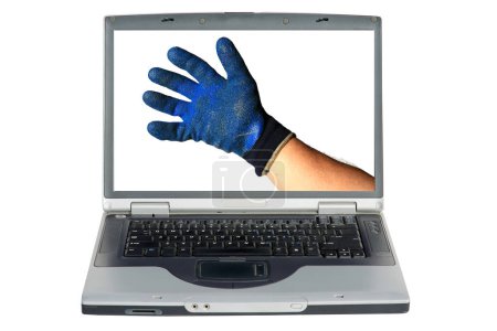 Foto de Ordenador portátil con una mano de hombre que usa guantes de seguridad de construcción - Imagen libre de derechos