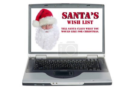 Téléchargez les photos : Écran d'ordinateur portable avec le Père Noël. Noël. Père Noël poster une liste de souhaits en ligne pour les gens du monde entier de publier leur demande - en image libre de droit