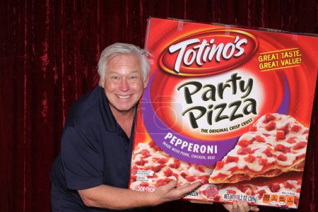 Photo for Lake Forest, California - USA - January 16, 2016: Photo Booth. A man smiles as he holds a GIANT Box of TOTINO'S Pepperoni Pizza while in a Photo Booth. People love a Photo Booth for all parties. - Royalty Free Image