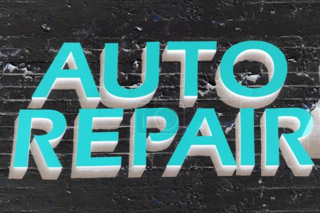 Photo for Auto Repair. Auto Repair sign. Mechanic. Car Mechanic. Auto repair shop. Auto repair service sign. The automotive industry. Car mechanic. Oil Change. Tune up. Tire Rotation. Valve adjustment. Gasoline - Royalty Free Image