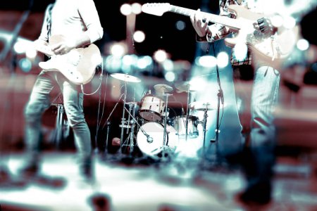 Photo for Live music background and music band on stage.Concert and music festival design.Guitarist and drum kit - Royalty Free Image