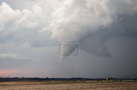 Photo for A cone tornado touches down in the rural countryside. - Royalty Free Image