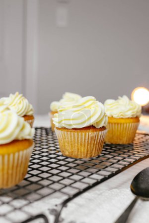 Photo for Carrot cupcakes inside with caramel filling and cream cheese - Royalty Free Image