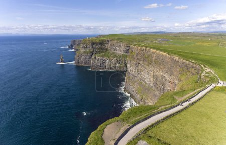 Photo for Aerial birds eye drone view from the world famous cliffs of moher in county clare ireland. Scenic Irish rural countryside nature along the wild atlantic way. - Royalty Free Image