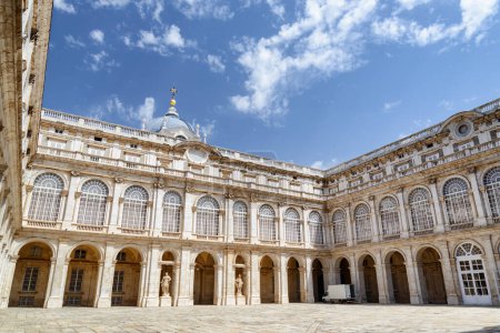 Photo for View of the facade of the Royal Palace of Madrid from the courtyard. Madrid is a popular tourist destination of Europe. - Royalty Free Image