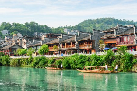 Photo for Awesome view of Phoenix Ancient Town (Fenghuang County) and the Tuojiang River (Tuo Jiang River) in China. Fenghuang is a popular tourist destination of Asia. - Royalty Free Image