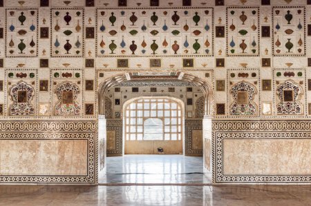 Photo for Jaipur, India - 12 November, 2018: Awesome interior view of the Sheesh Mahal (Mirror Palace) at the Amer Fort (Amber Fort) in Rajasthan. Jaipur is a popular tourist destination of South Asia. - Royalty Free Image