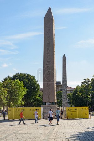 Photo for Istanbul, Turkey - September 14, 2021: View of the Obelisk of Theodosius and the Walled Obelisk (Constantine's Obelisk) in Sultanahmet Square. The square is a popular tourist attraction in Turkey. - Royalty Free Image