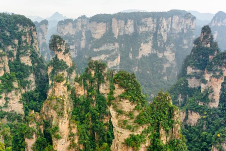 Awesome view of natural quartz sandstone pillars of the Tianzi Mountains (Avatar Mountains) in the Zhangjiajie National Forest Park, Hunan Province, China. Fabulous landscape.