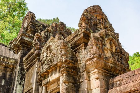 Ancient buildings of Thommanon temple in enigmatic Angkor, Siem Reap, Cambodia. Mysterious Thommanon nestled among rainforest. Angkor wat is a popular tourist attraction.