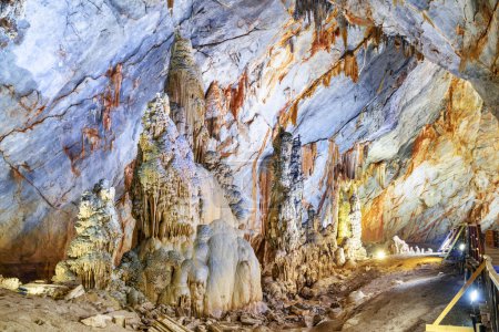 Amazing stalagmites at scenic underground chamber inside Paradise Cave (Thien Duong Cave) at Phong Nha-Ke Bang National Park in Vietnam. Paradise Cave is a popular tourist attraction of Asia.
