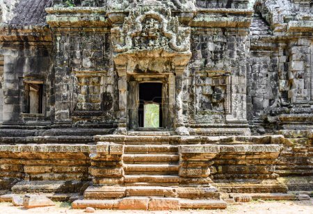 Ancient buildings of Thommanon temple in enigmatic Angkor, Siem Reap, Cambodia. Mysterious Thommanon nestled among rainforest. Angkor wat is a popular tourist attraction.