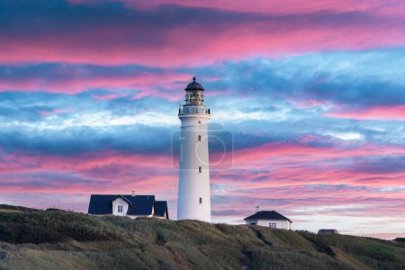 Photo for Amazing pink sunset view of Hirtshals lighthouse in Denmark. Landscape photography - Royalty Free Image