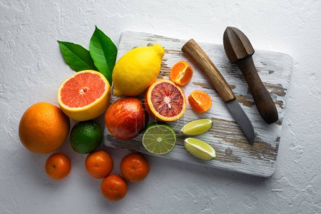 Photo for Closeup photography showcasing a vibrant assortment of different citrus fruits, emphasizing the significance of a healthy and vitamin-fueled diet. Food photography - Royalty Free Image