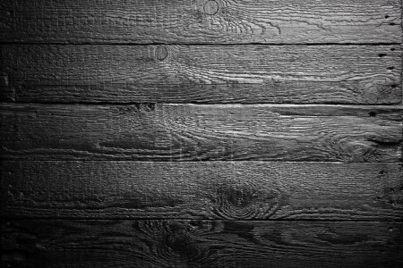 Photo for Background of naturally aged black painted wooden oak boards. Natural texture - Royalty Free Image