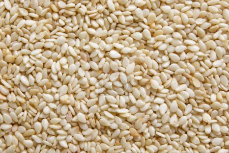 Sesame grains close-up, background. Top view