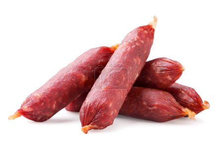 A pile of smoked small sausages close-up on a white background. Isolated