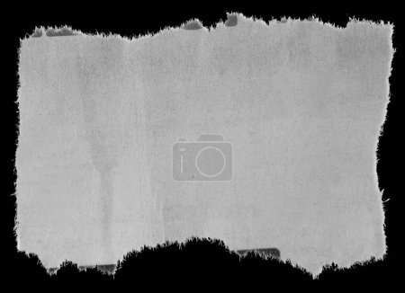 Téléchargez les photos : Pièce de papier déchiré sur noir - en image libre de droit