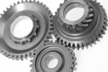 Photo for Metal cog gears joining together - Royalty Free Image