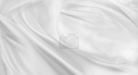 Foto de Fondo de textura de tela de seda blanca ondulada - Imagen libre de derechos