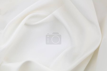 Rippled white silk fabric texture backgroun