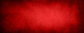 Red textured concrete wall background Poster #650986918