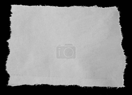 Téléchargez les photos : Pièce de papier déchiré sur noir - en image libre de droit