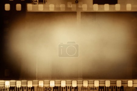 Foto de Película marcos negativos fondo marrón - Imagen libre de derechos